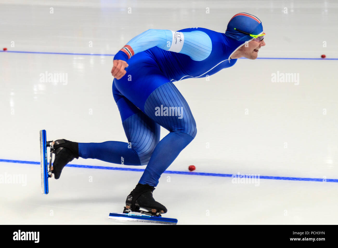 Competing in the Speed Skating - Mens' 500m at the Olympic Winter Games PyeongChang 2018 Stock Photo
