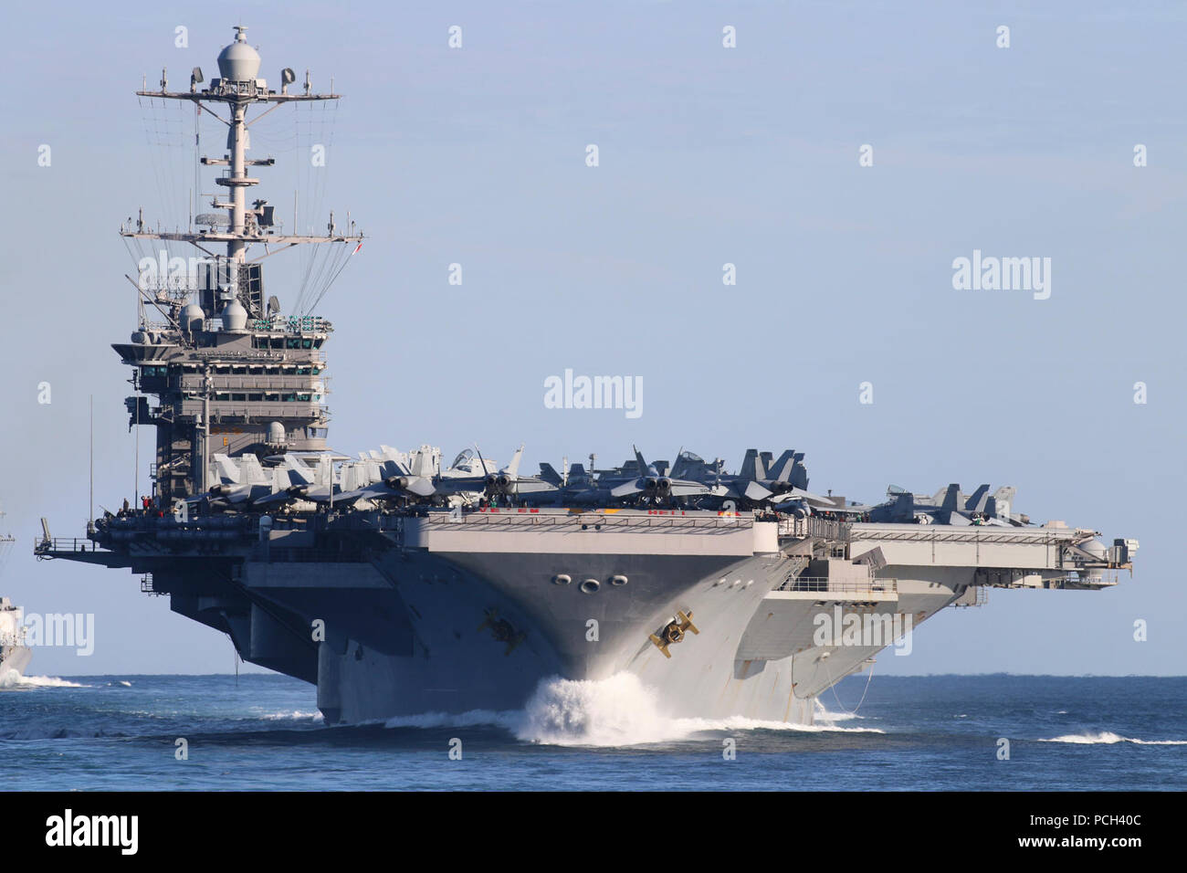 ATLANTIC OCEAN (Feb. 6, 2018) The aircraft carrier Harry S. Truman (CVN 75) participates in a composite unit training exercise (COMPTUEX). Truman is underway as a part of the Harry S. Truman Carrier Strike Group (HSTCSG) performing COMPTUEX, which evaluates the strike group’s ability as a whole to carry out sustained combat operations from the sea, ultimately certifying the HSTCSG for deployment. Stock Photo