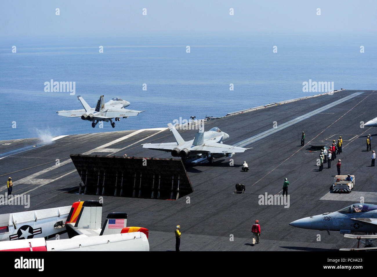 A U.S. Navy F/A-18E Super Hornet aircraft assigned to Strike Fighter Squadron (VFA) 213 takes off from the aircraft carrier USS George H.W. Bush (CVN 77) Sept. 2, 2014, in the Persian Gulf. The George H.W. Bush was supporting maritime security operations and theater security cooperation efforts in the U.S. 5th Fleet area of responsibility. Stock Photo