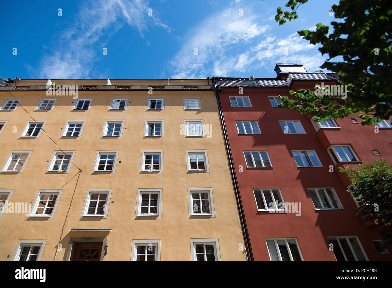 Residential buildings upwards and blue sky in Sodermalm in Stockholm