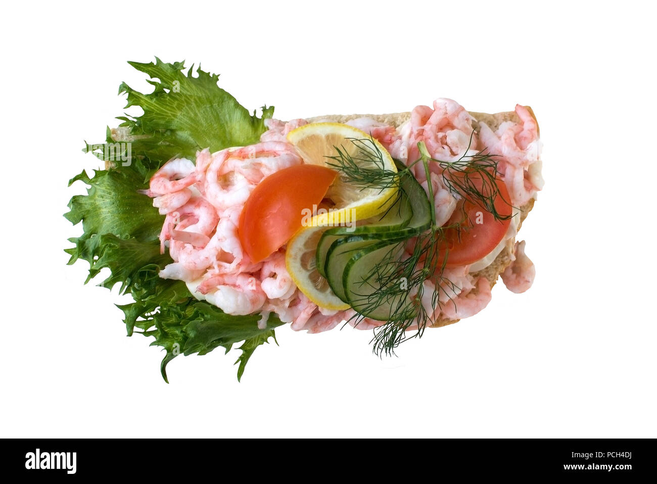 Shrimp sandwich with tomato lemon and salad leaf traditional Swedish food Stock Photo