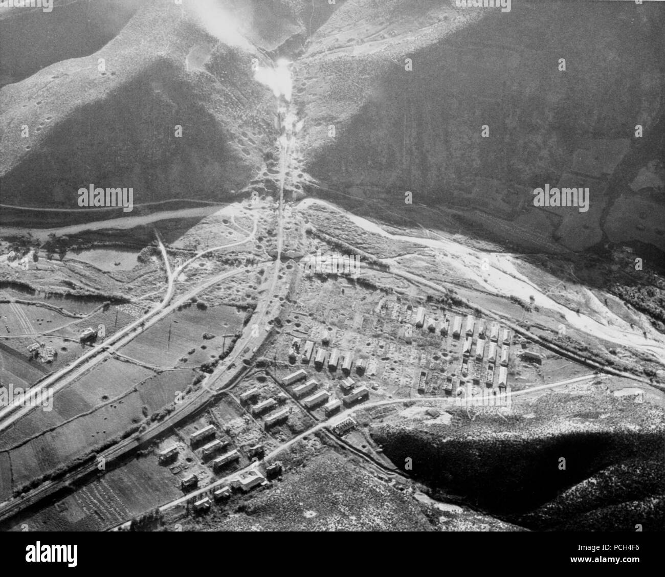 Planes from USS Bon Homme Richard (CVA31) fire rockets at a train, as