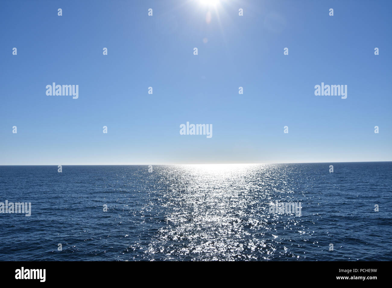cloudless evening sky and sun, North Sea. View from ship. June, 2018 Stock Photo