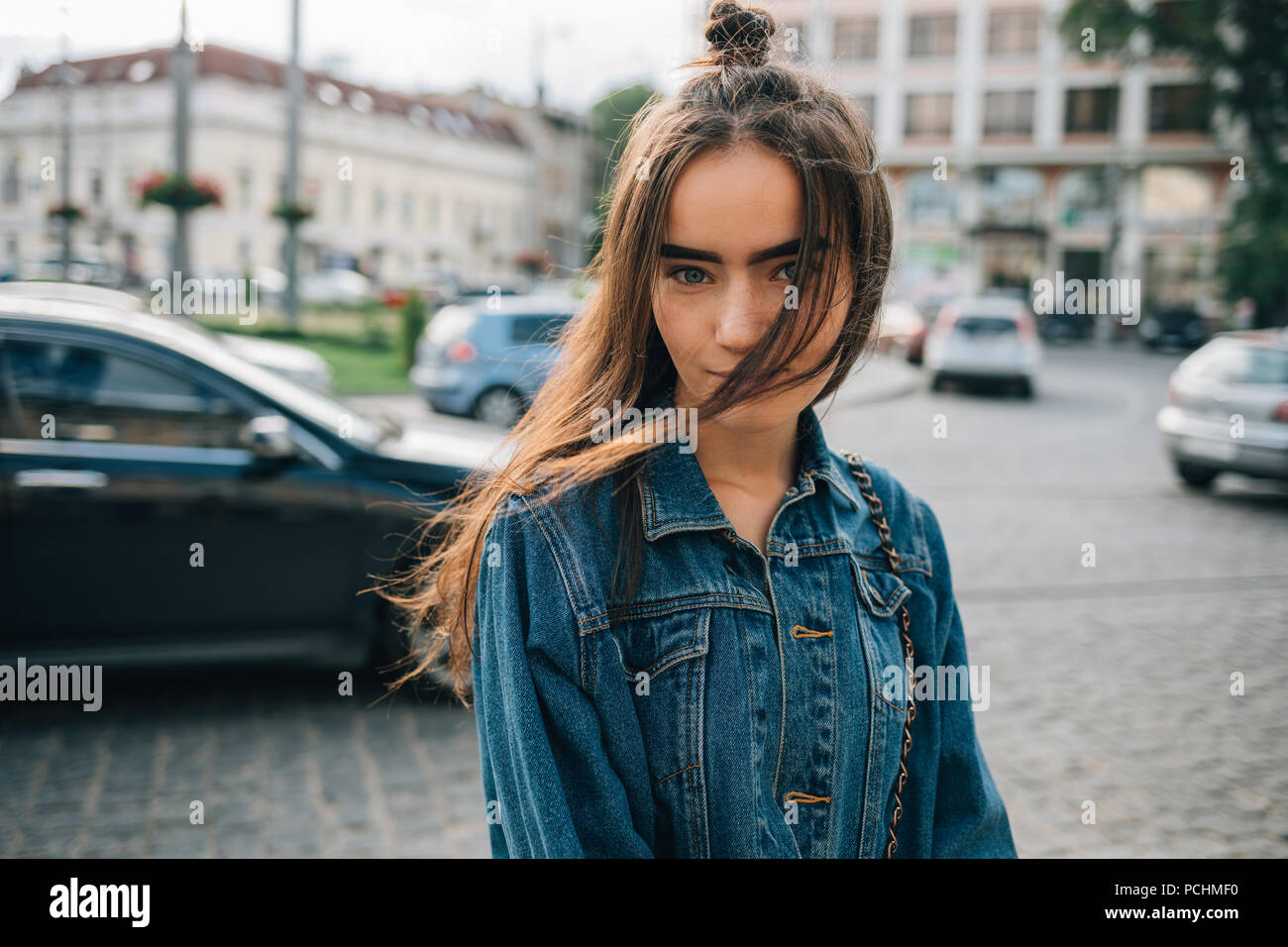 long dark blue denim jacket