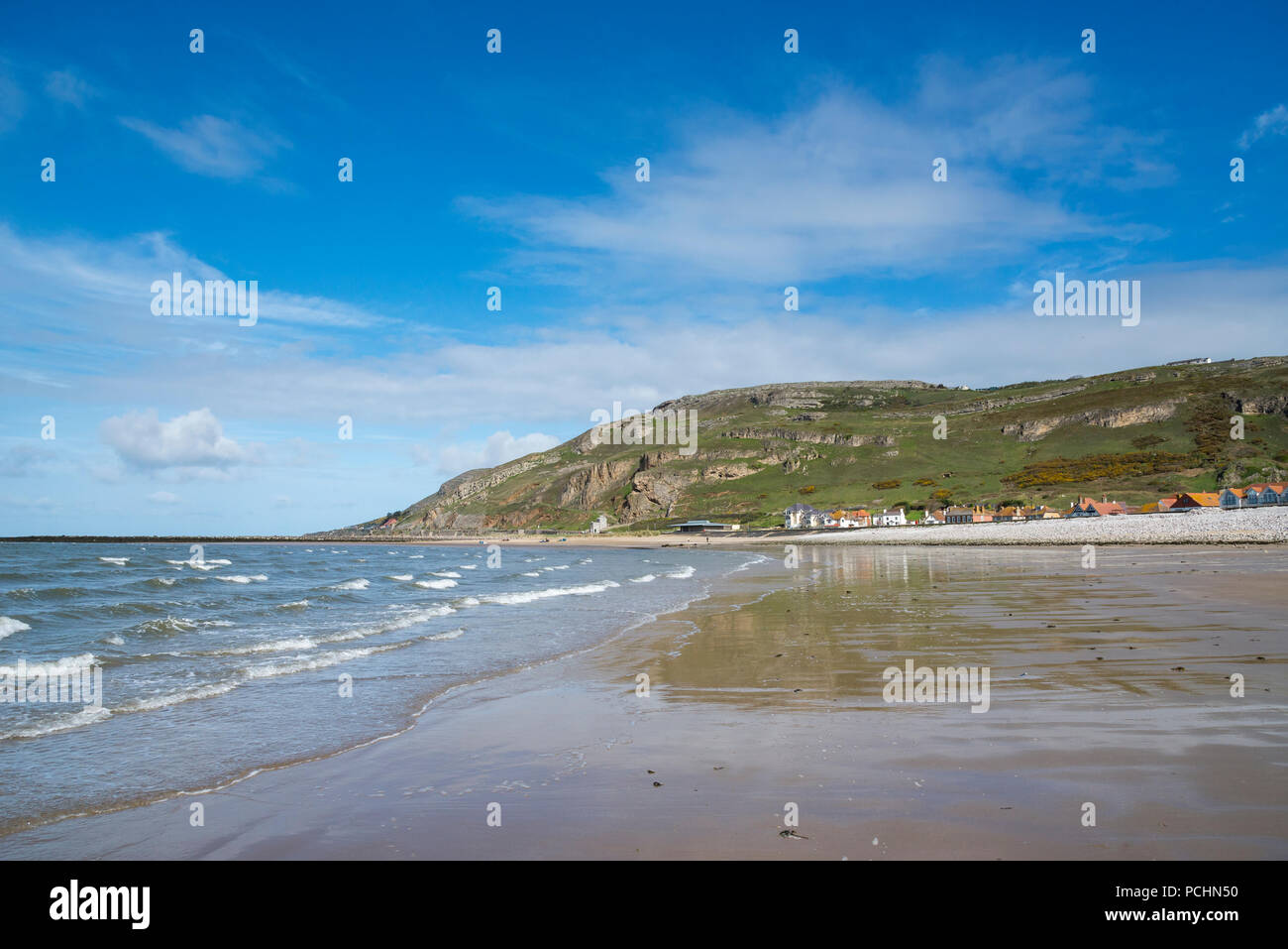 West shore beach, Llandudno, North Wales. A sunny spring day looking toward the Great Orme. Stock Photo