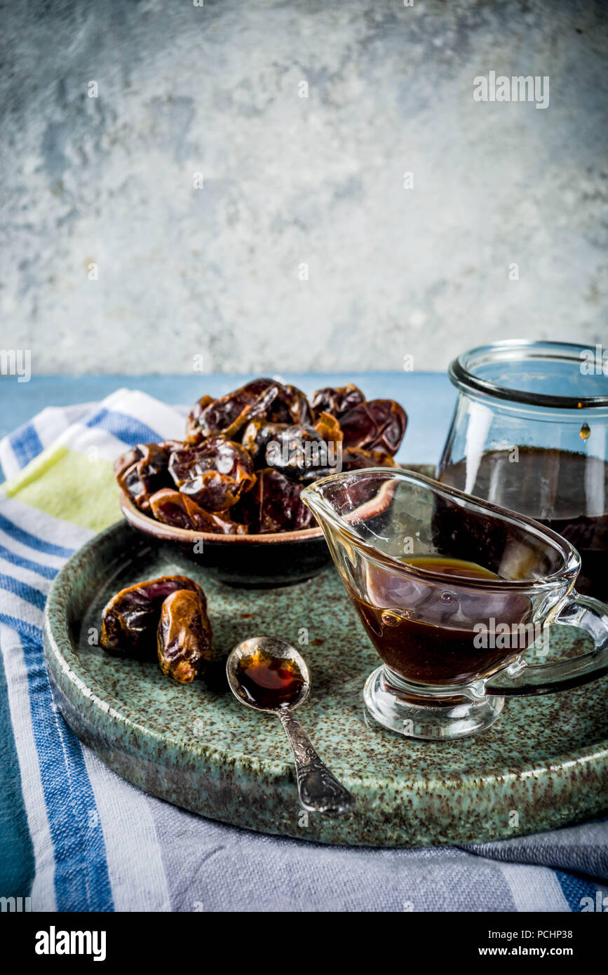 Date honey with dried dates, Jewish national sweet food, copy space