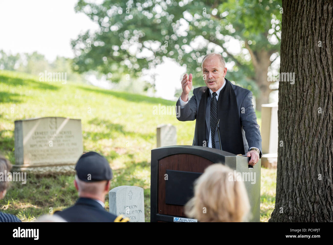 Chap. (Col.) Kenneth Sampson (ret.) gives remarks as the keynote speaker during a ceremony in honor of the 243rd U.S. Army Chaplain Corps Anniversary at Chaplains Hill in Section 2 of Arlington National Cemetery, Arlington, Virginia, July 27, 2018.  A wreath was laid at Chaplains Hill by Chaplain (Maj. Gen.) Paul K. Hurley, chief of chaplains, U.S. Army Chaplain Corps, and Sgt. Maj. Ralph Martinez, regimental sergeant major, U.S. Army Chaplain Corps.  (U.S. Army photo by Elizabeth Fraser / Arlington National Cemetery / released) (Photo was taken in color and turned to black-and-white) Stock Photo