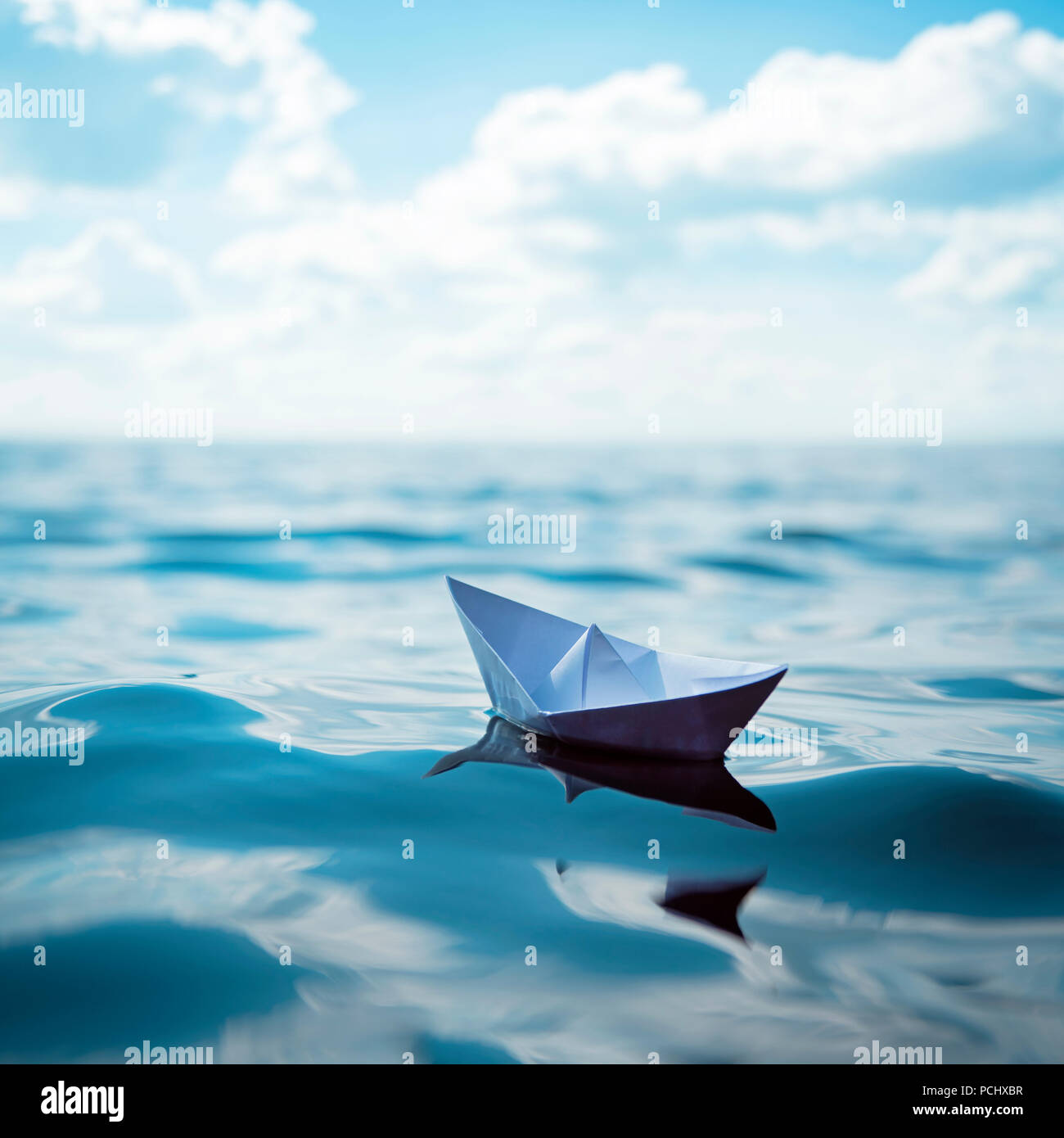 Folded paper boat hi-res stock photography and images - Alamy