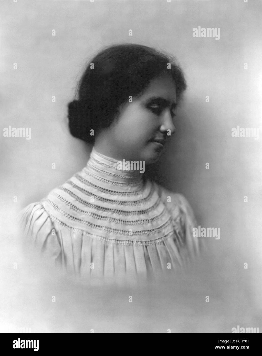 Helen Keller, portrait head and shoulders looking right in 1905 at an unknown location. Helen Keller (June 27, 1880 – June 1, 1968) was an American author, political activist, and lecturer. She was the first deaf-blind person to earn a bachelor of arts degree. Stock Photo