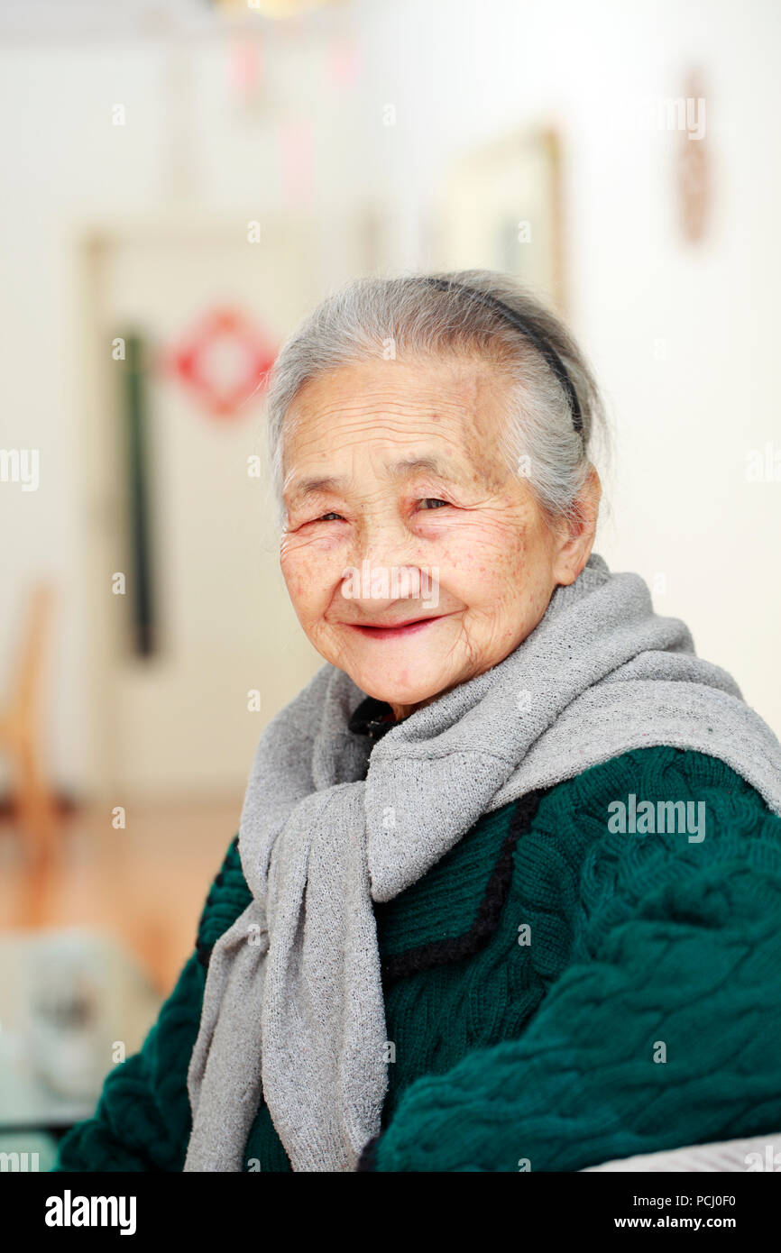 Happy senior asian woman potrait in home Stock Photo