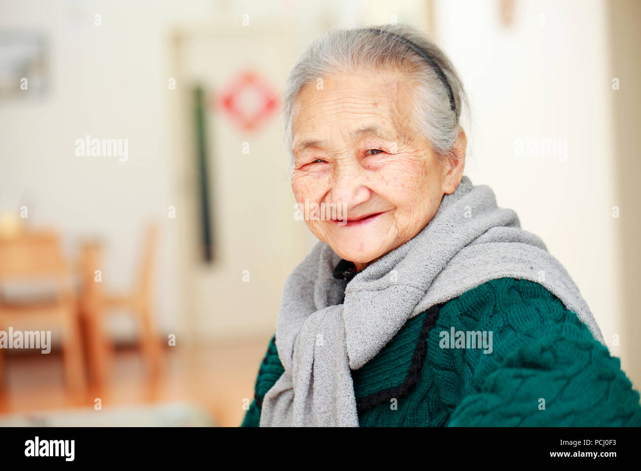 Happy senior asian woman potrait in home Stock Photo