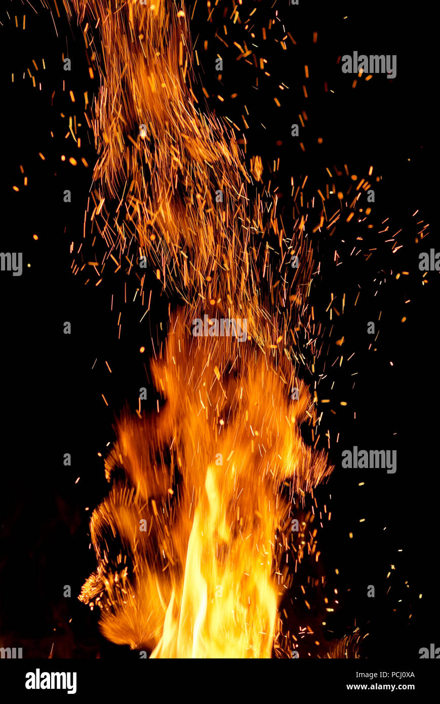 Fire flames with sparks on black background Stock Photo - Alamy