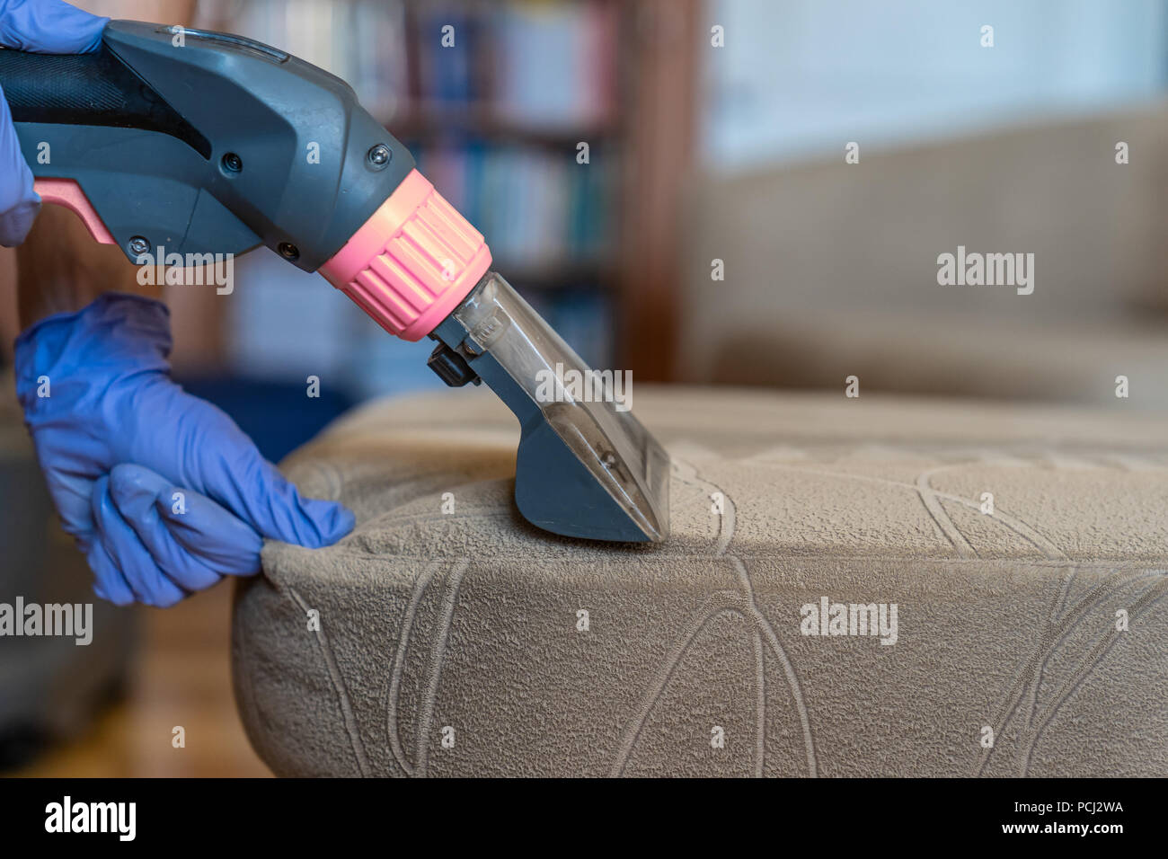 Closeup of upholstered Sofa chemical cleaning Stock Photo Alamy