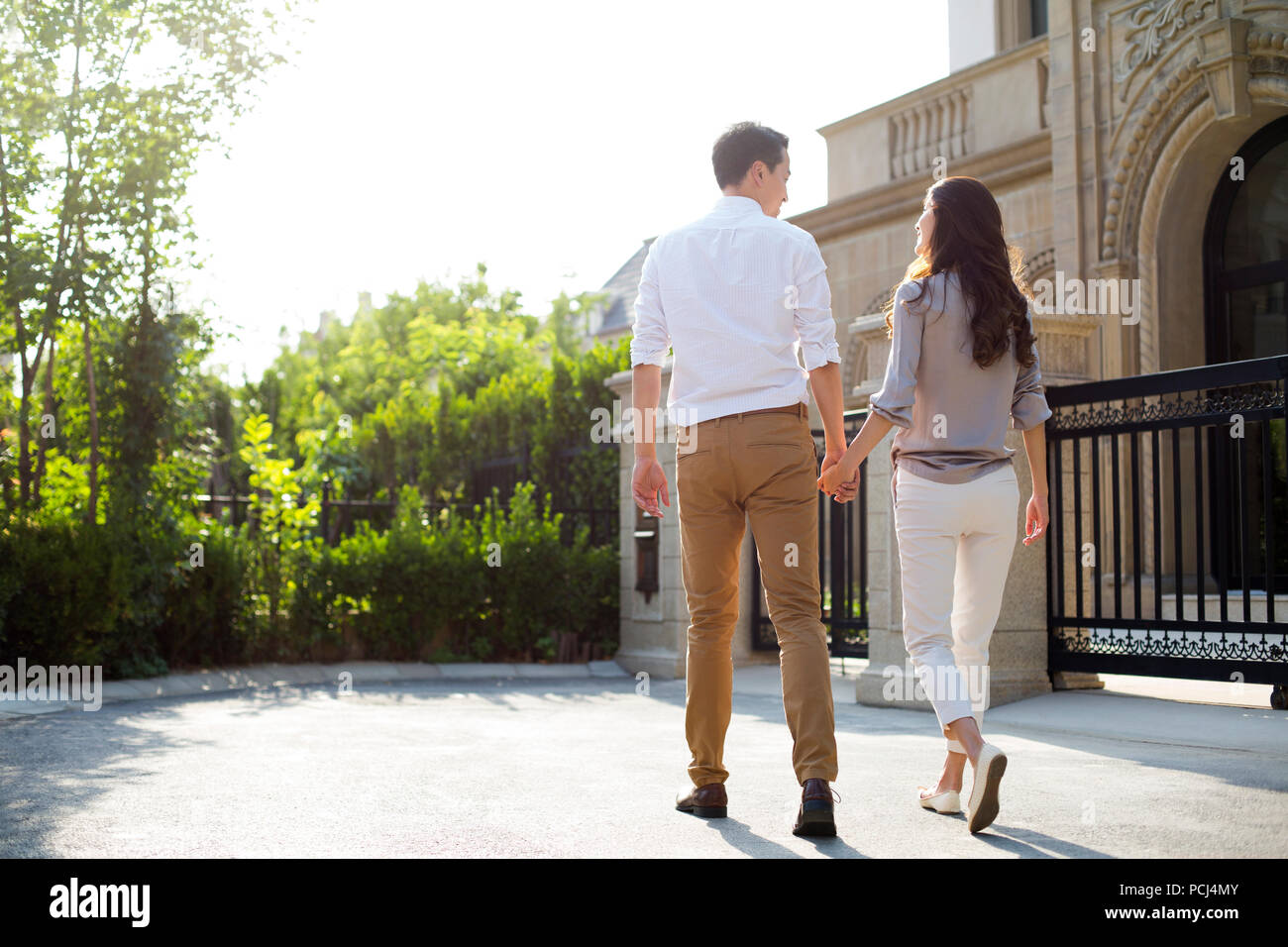Indian couple holding hands hi-res stock photography and images - Alamy