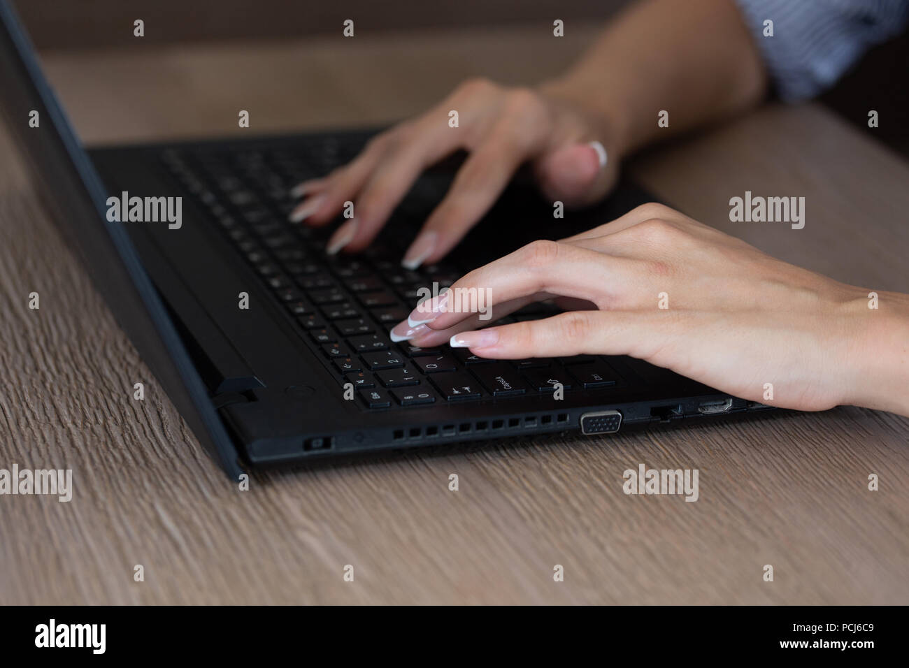 Caucasian woman hands typing on tablet closeup Stock Photo