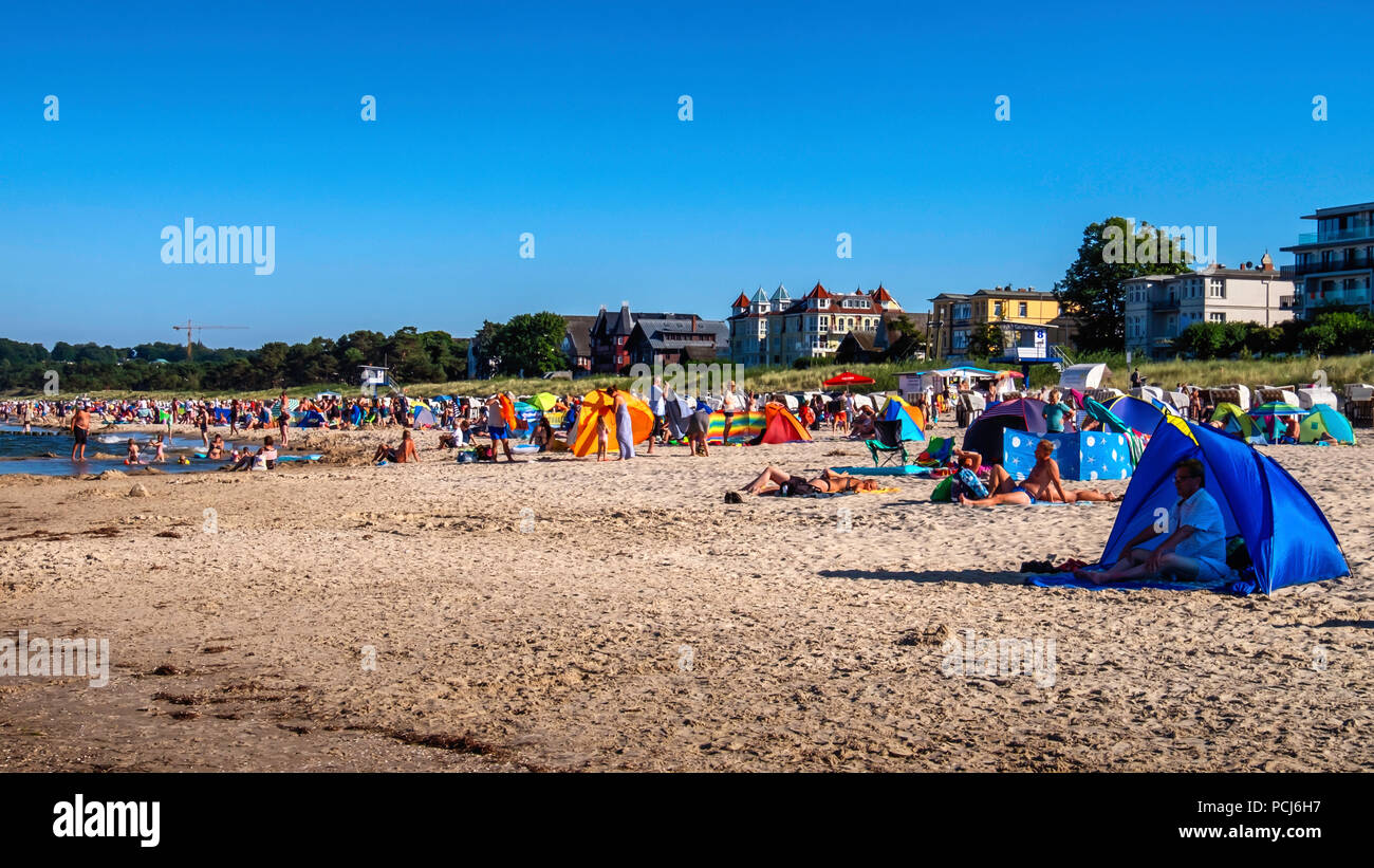 Crowded Bansin beach as people holiday at the Baltic sea resort on Usedom Island during 2018 Summer heat wave, Heringsdorf, Germany Bansin beach is th Stock Photo
