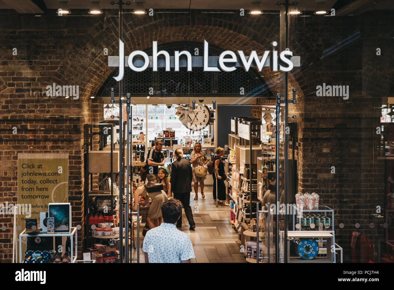 People entering John Lewis shop inside St. Pancras station, one of the