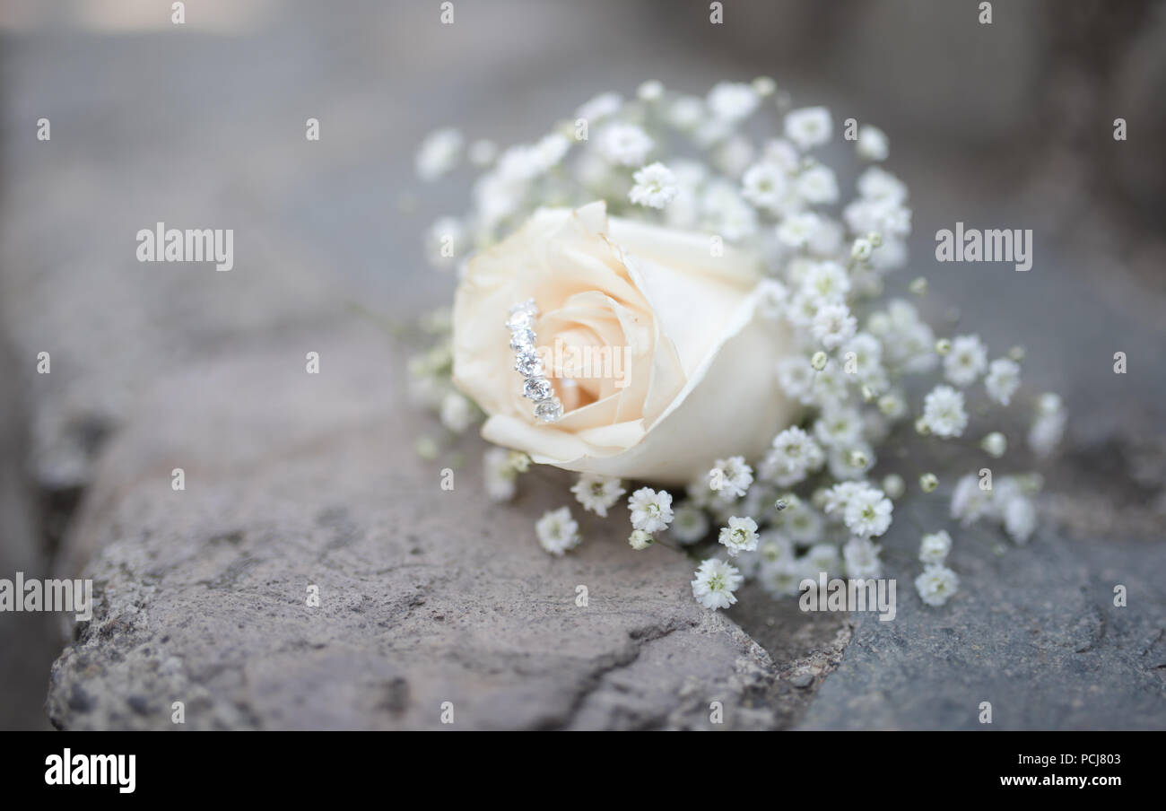 Wedding decoration and flowers with wedding rings Stock Photo
