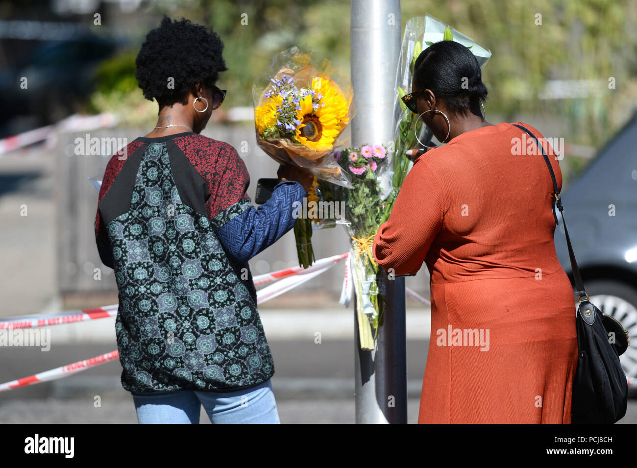 Friends leave floral tributes in Warham Street in Camberwell, south ...