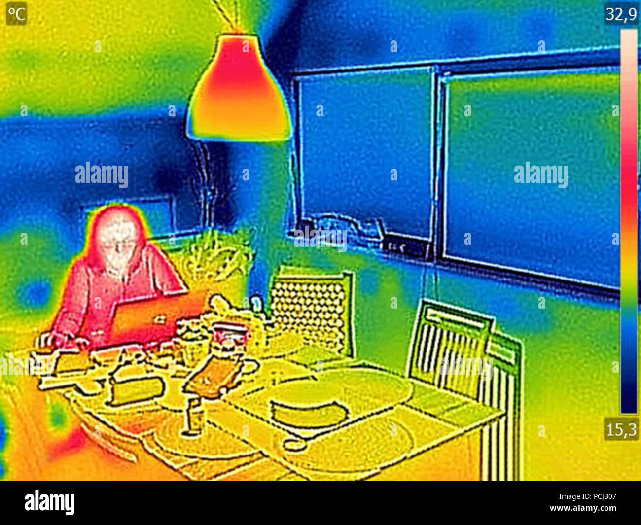 Thermal image Photo while woman on a laptop Stock Photo
