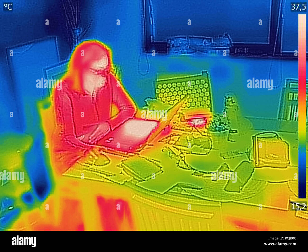 Thermal image Photo while woman on a laptop Stock Photo