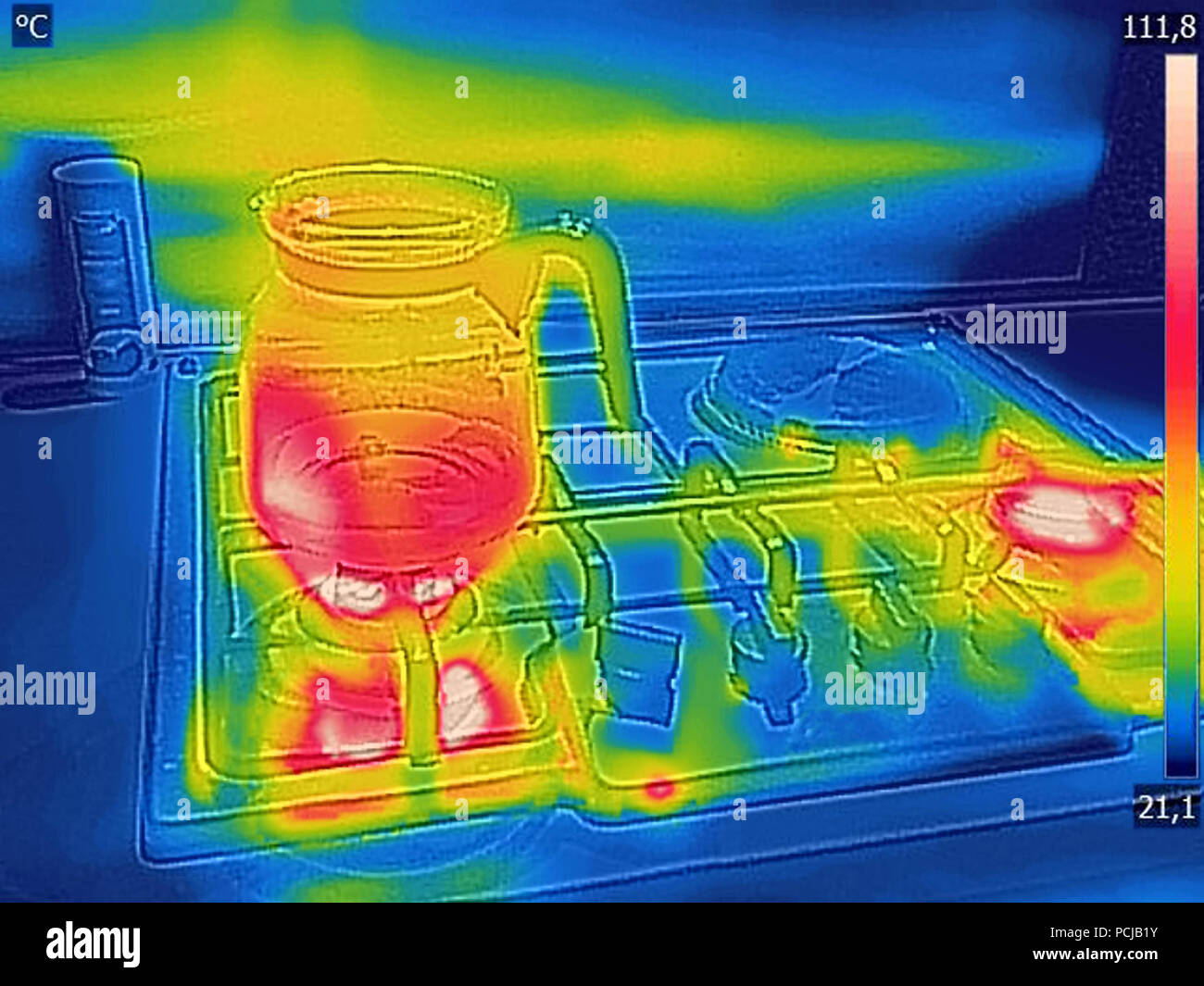 Thermal image Photo while cooking tea on a gas stove Stock Photo