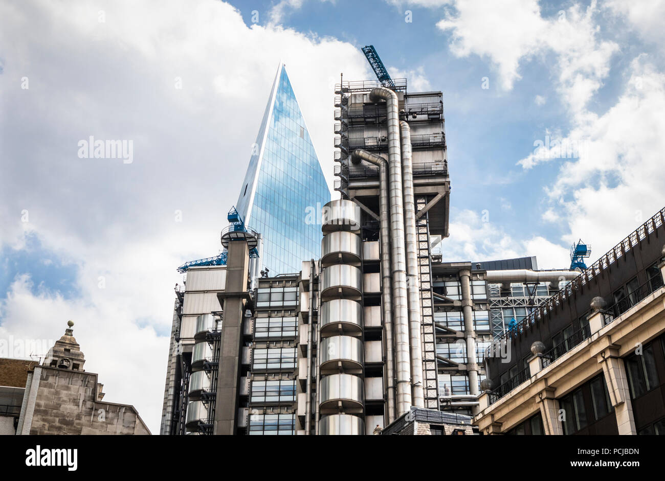 The Scalpel seen behind The Lloyds' Building in the heart of the City of London insurance 