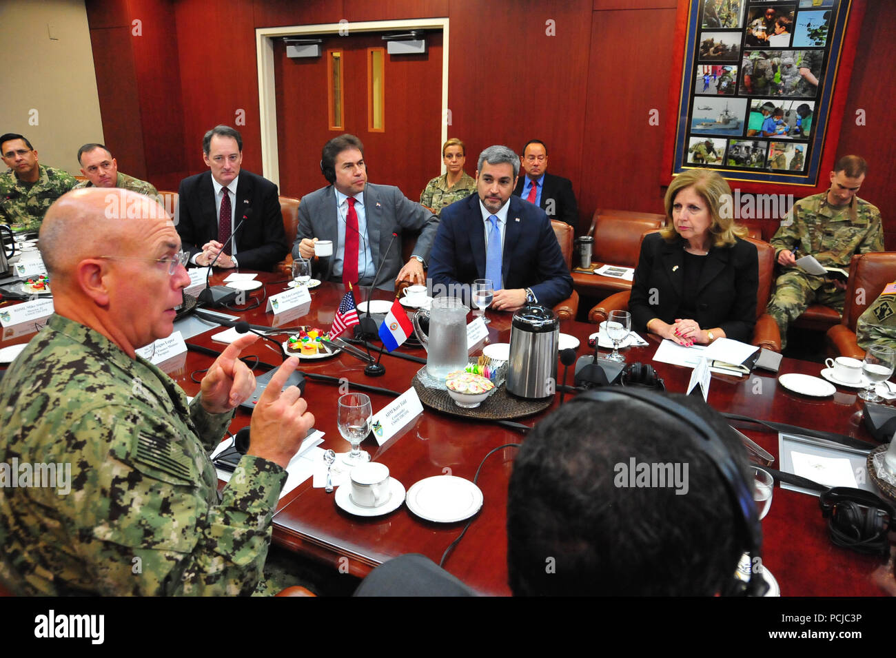 Mario Abdo Benitez, President-elect of Paraguay, listens to U.S. Navy Adm. Kurt Tidd, commander of U.S. Southern Command, while discussing the U.S.-Paraguay defense partnership during a meeting with members of the U.S. military headquarters July 30. The close collaborative ties between the United States and Paraguay include many decades of strong security cooperation based on common interests, shared goals and mutual respect. (U.S. Southern Command photo by Juan Chiari) Stock Photo