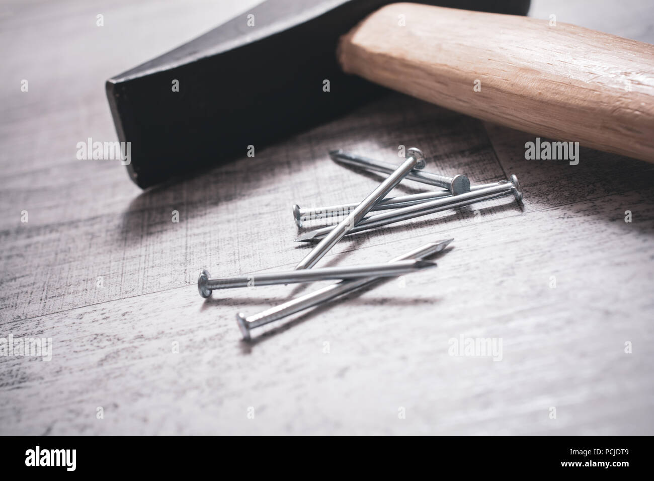 Hammer And Nails On A Table, DIY Concept Stock Photo