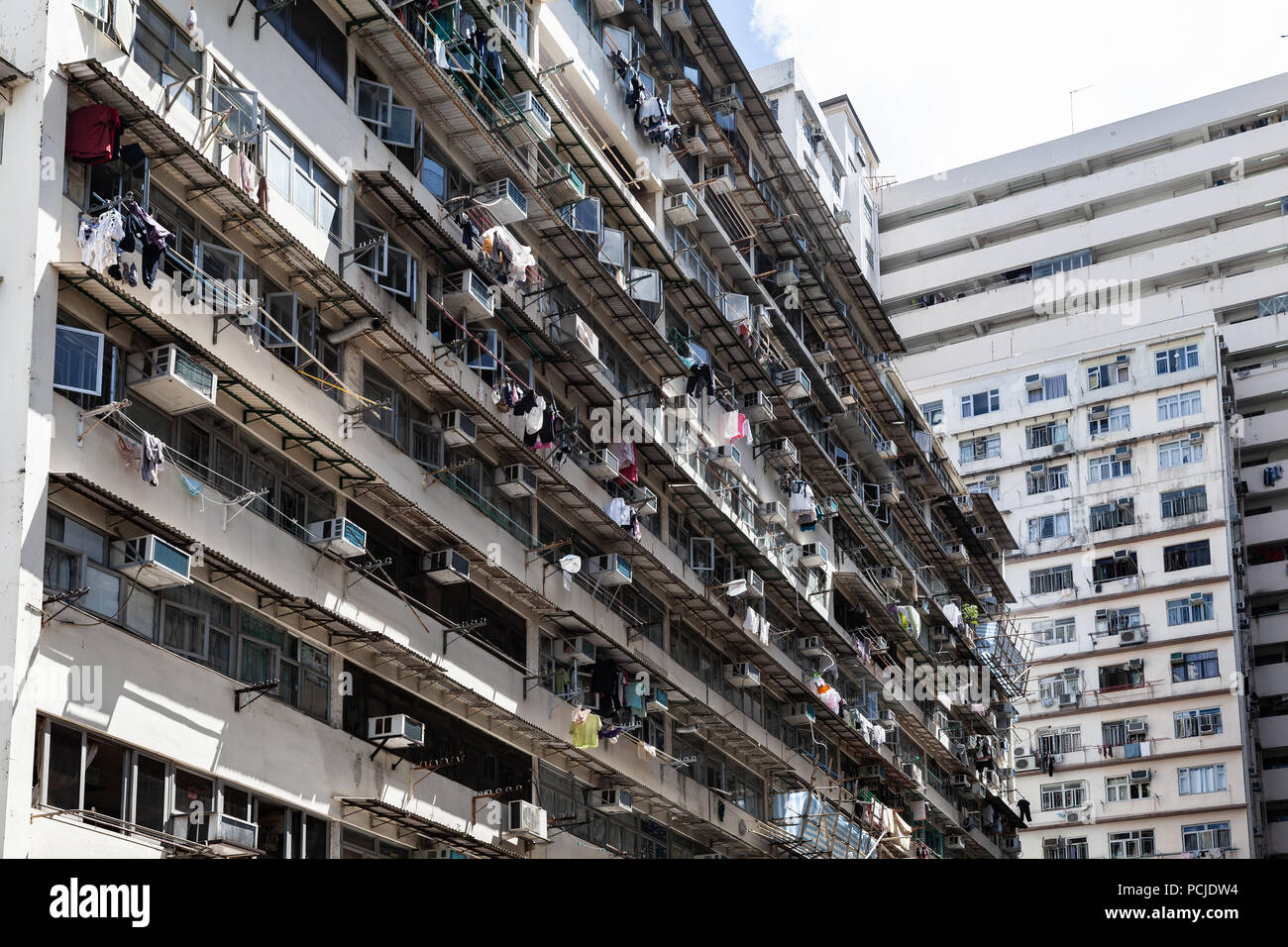 Hong kong apartment building clothes hires stock photography and