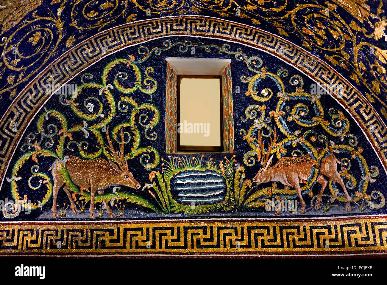 Lunette with a deerin the  Mausoleum of Galla Placidia in Ravenna(386 - 450 AD) Mosaics ( late Roman and Byzantine architecture,) Emilia-Romagna - Northern Italy. ( UNESCO World Heritage site ) Stock Photo