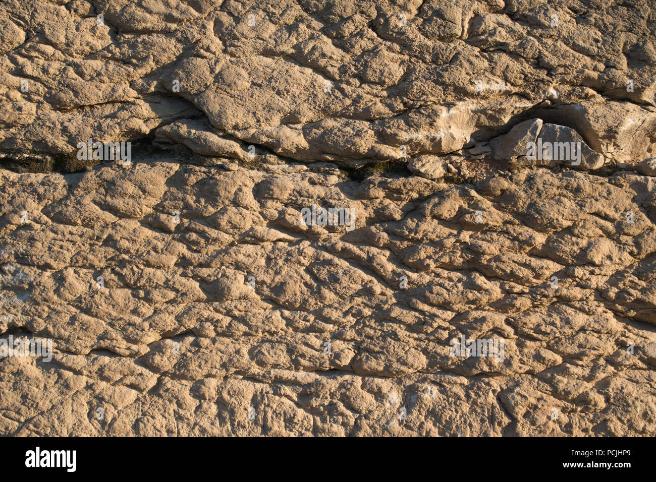 Weathered limestone rock face geology wallpaper background, showing ...