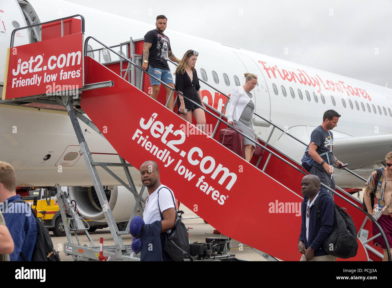 Passengers getting off an Jet2 plane at Stansted Airport,Essex Stock