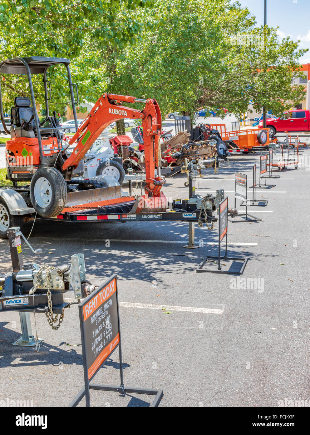 HICKORY, NC, USA-26 JULY 18: A row of equipment for rent at Home Depot, a big-box store, selling tools, remodeling and construction materials. Stock Photo