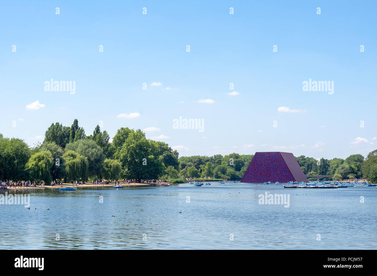 The Serpentine Lake at Hyde Park with the London Mastaba in the background in summer 2018 Stock Photo