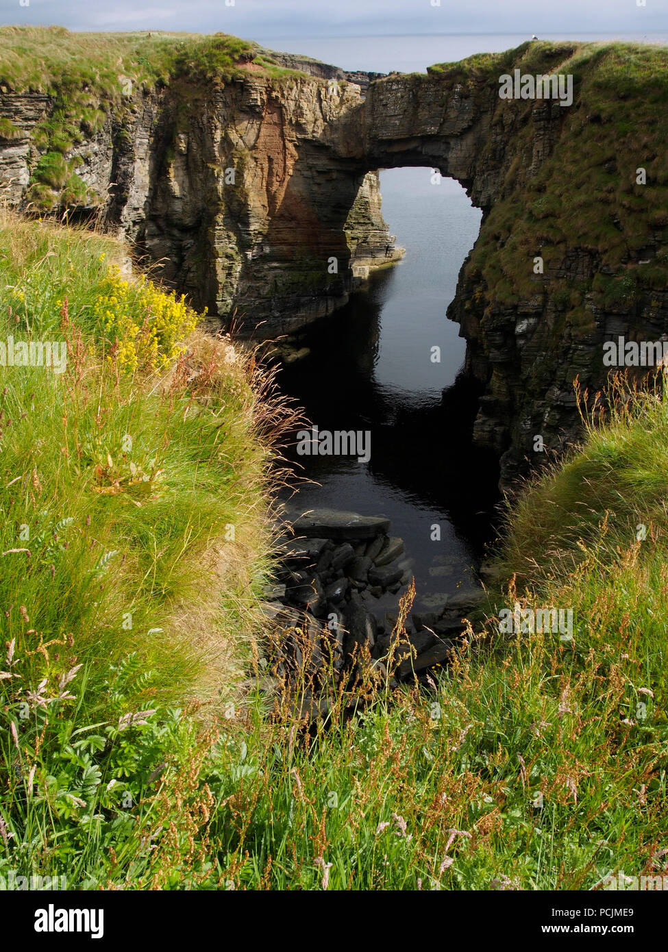 Sea arch, Vats of Kirbuster, Stronsay, Orkney Stock Photo