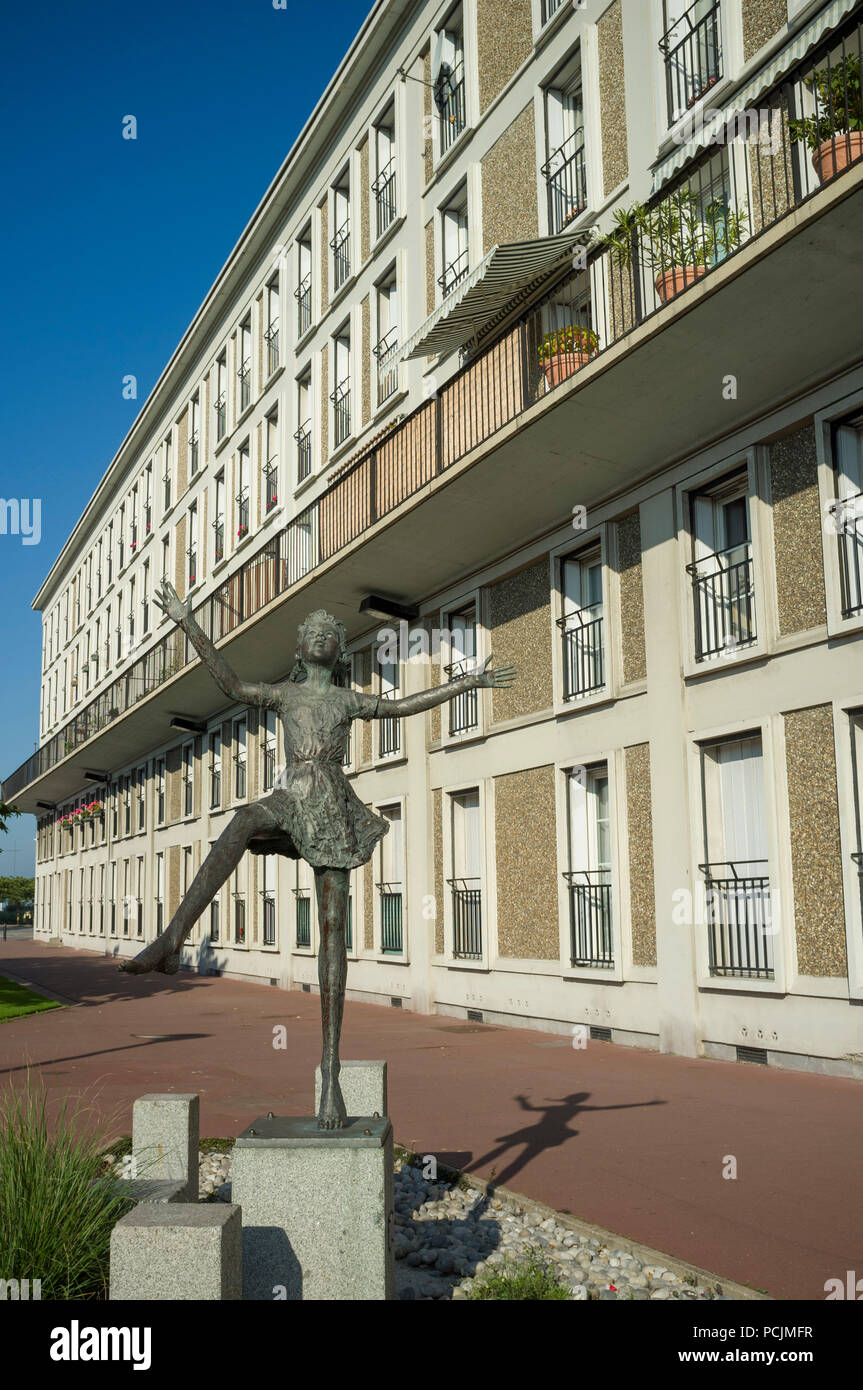 Statue of girl dancer by iconic Auguste Perret apartments in Le Havre, France Stock Photo