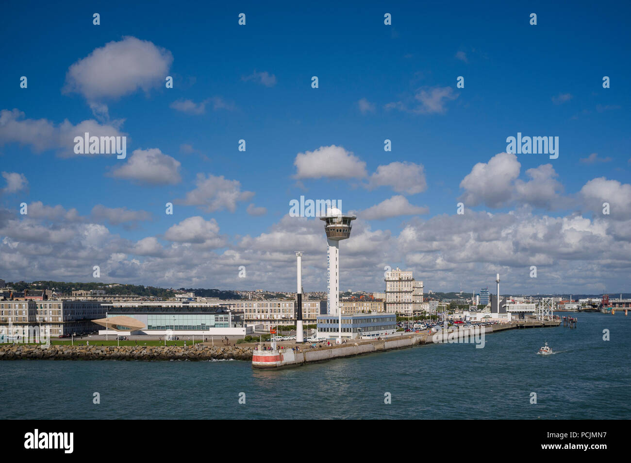 View of Le Havre from the sea showing the Musee Malraux and iconic apartments by Auguste Perret with blue sky and fluffy white cumulus clouds Stock Photo