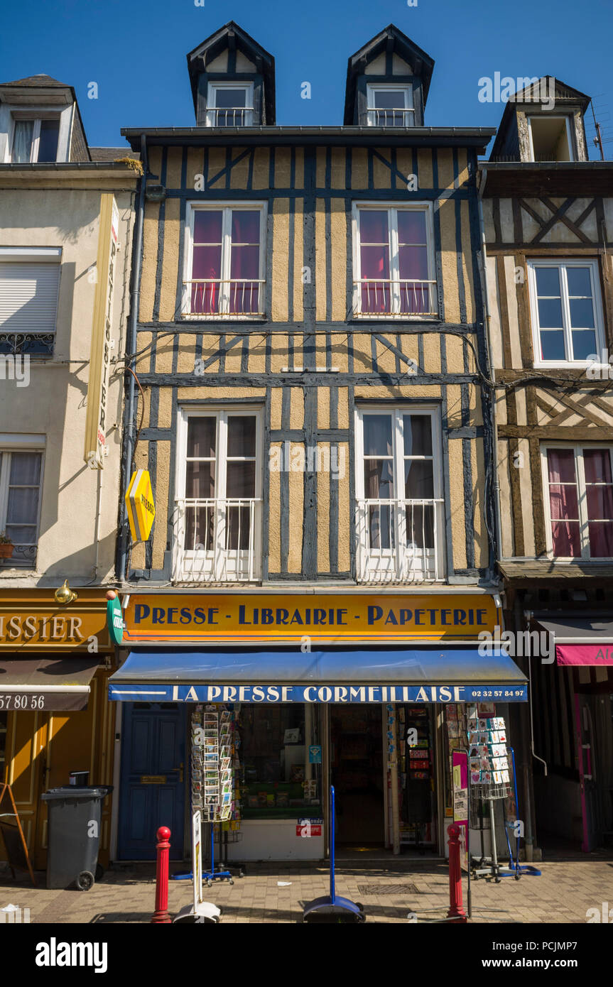 Ancient half-timbered newsagent presse papeterie librairie in the high street in Cormeilles, Normandy, France Stock Photo