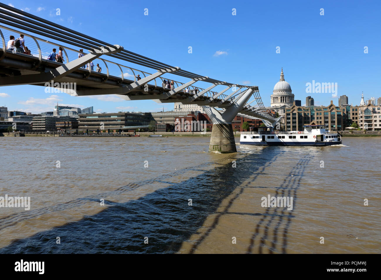 A fabulous sunny day crossing the Millennium Bridge to Saint Paul’s Cathedral in Central London Stock Photo