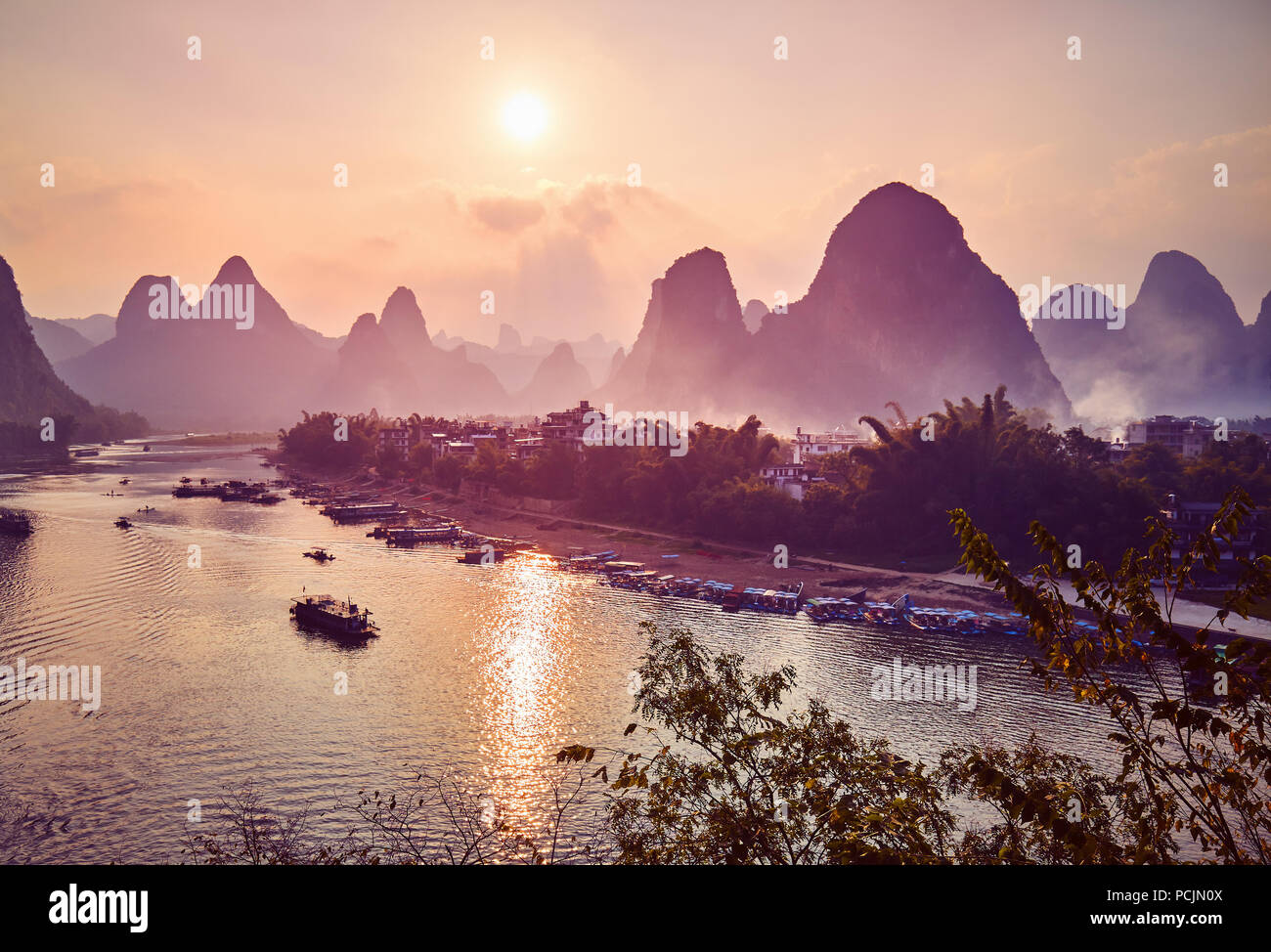 Scenic sunset over Li River in Xingping, color toning applied, China. Stock Photo