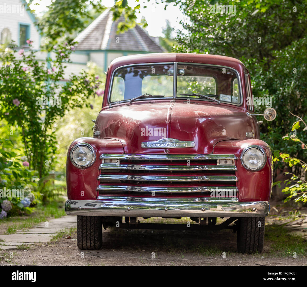 old red Chevrolet pick up truck Stock Photo