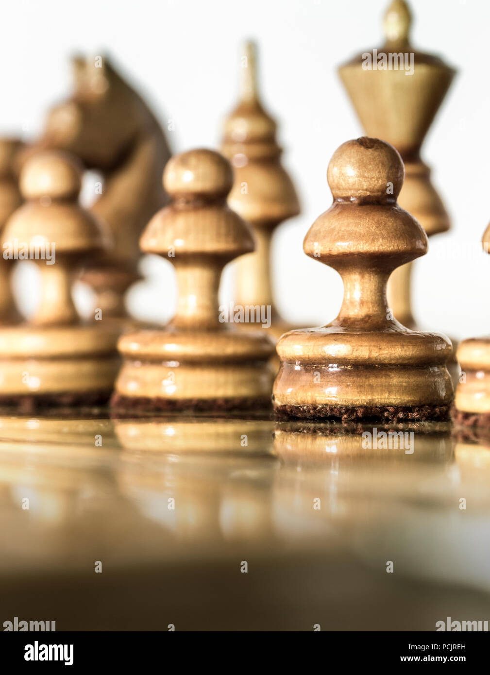 Chess pieces in starting position on a wooden oak Board Stock Photo - Alamy