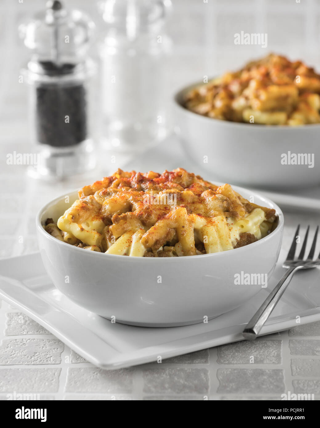 Beef mac and cheese. Minced beef and macaroni cheese. Stock Photo