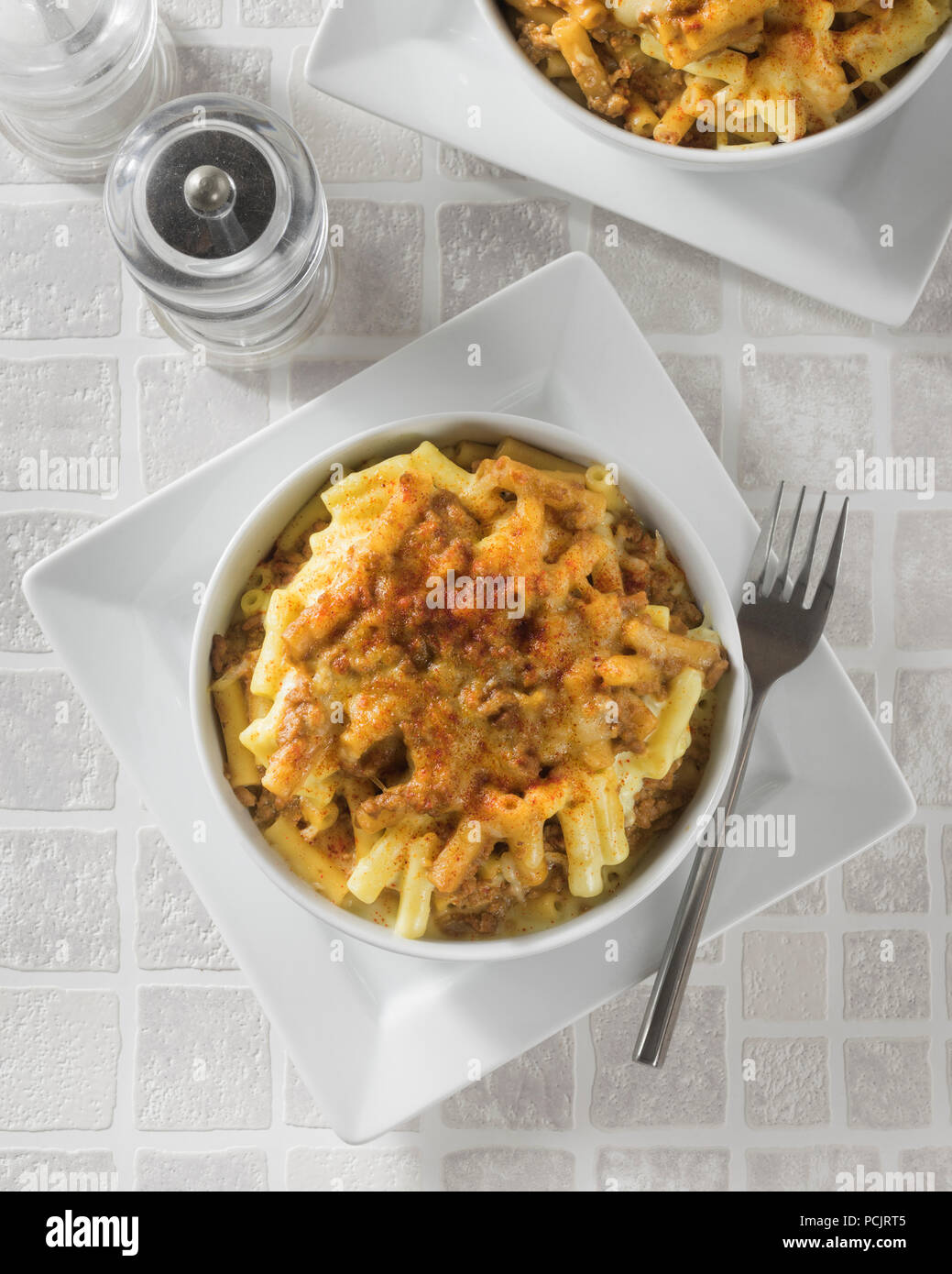 Beef mac and cheese. Minced beef and macaroni cheese. Stock Photo