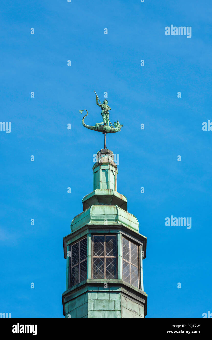 View of weather vane depicting St George slaying a dragon on the cupola of the 15th century Brotherhood of St George building, Gdansk, Poland Stock Photo