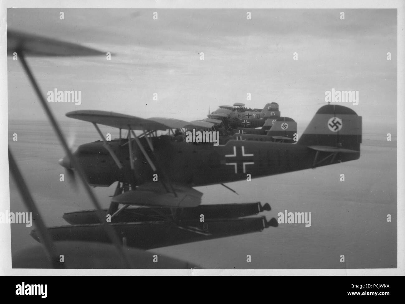 Image from the photo album of Oberleutnant Wilhelm Gaul: Heinkel He 60 floatplanes of 1. Staffel, Küstenfliegergruppe 106 practice formation flying in 1938. Stock Photo