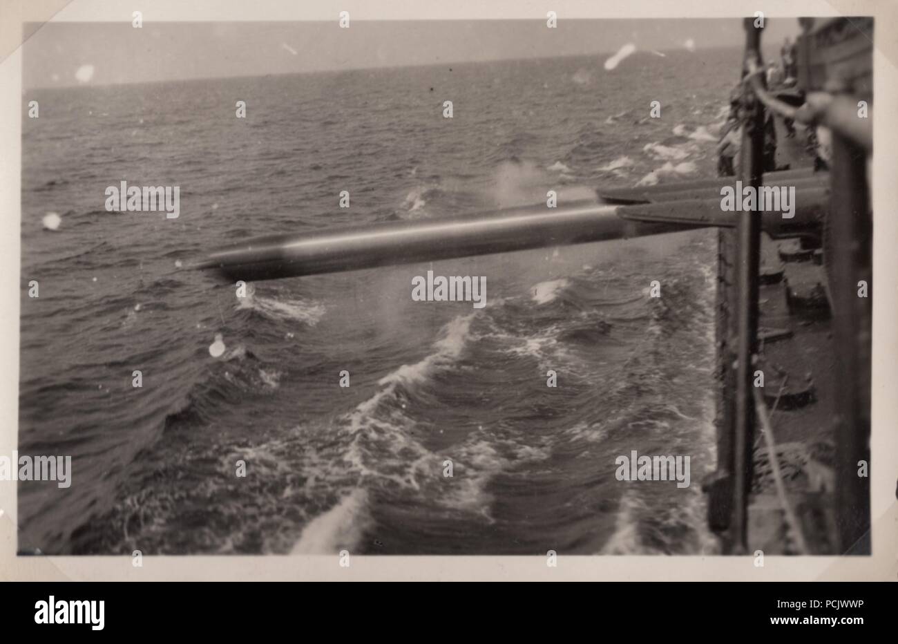 Image from the photo album of Oberfänrich Wilhelm Gaul - German Torpedoboot Leopard (Torpedo Boat Leopard) launches a torpedo during practice in the Spanish Civil War. Stock Photo