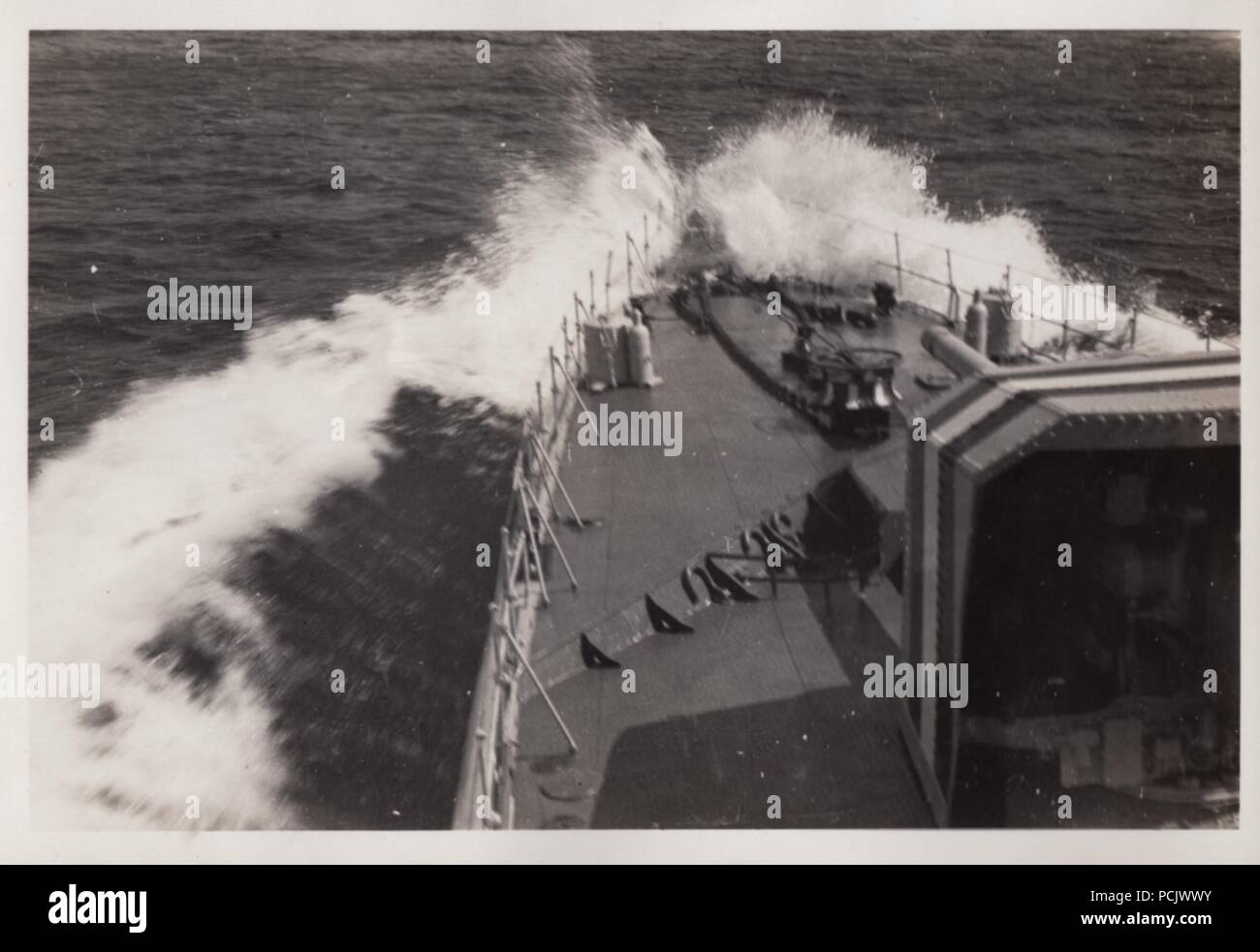 Image from the photo album of Oberfänrich Wilhelm Gaul - The bow of German Torpedoboot Leopard (Torpedo Boat Leopard) in heavy seas during the Spanish Civil War. Stock Photo