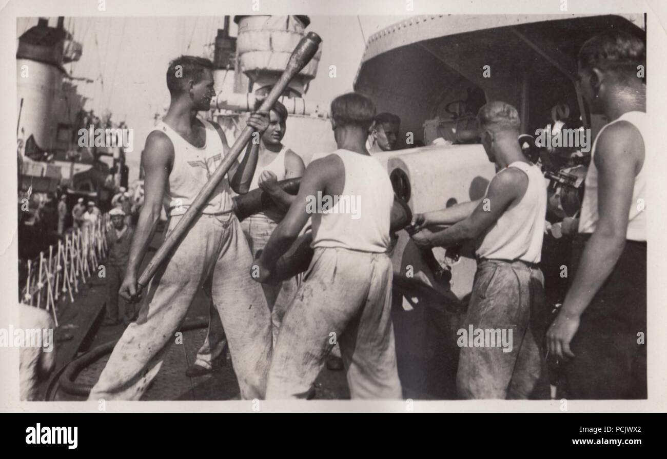 Image from the photo album of Oberfänrich Wilhelm Gaul - Loading the main deck gun on German Torpedoboot Leopard (Torpedo Boat Leopard) in 1937, during the Spanish Civil War. Stock Photo